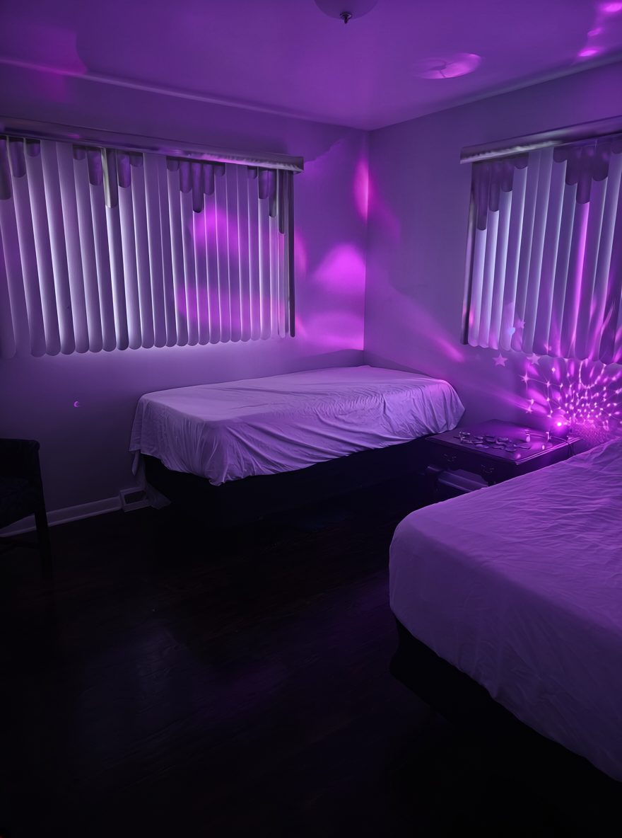 Purple-themed play room at Mixology at the Manor